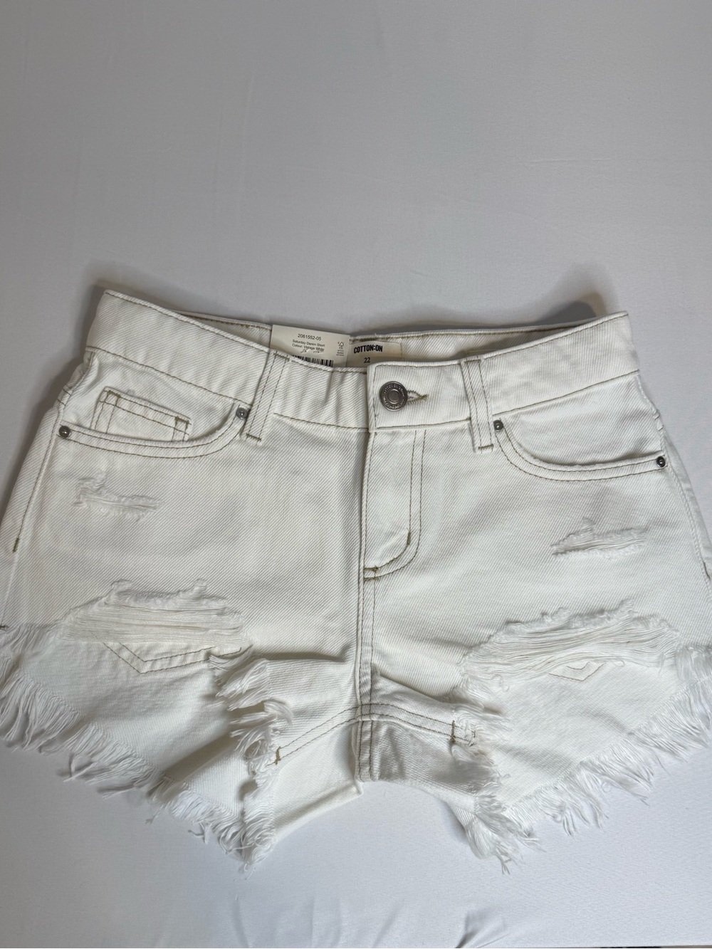 Cotton On NWT," "Rigid Denim," and "Festival Aesthetic